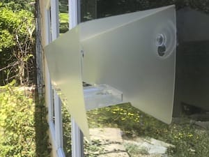 The outdoor sampler collects spores from the outside air to compare to indoor air.